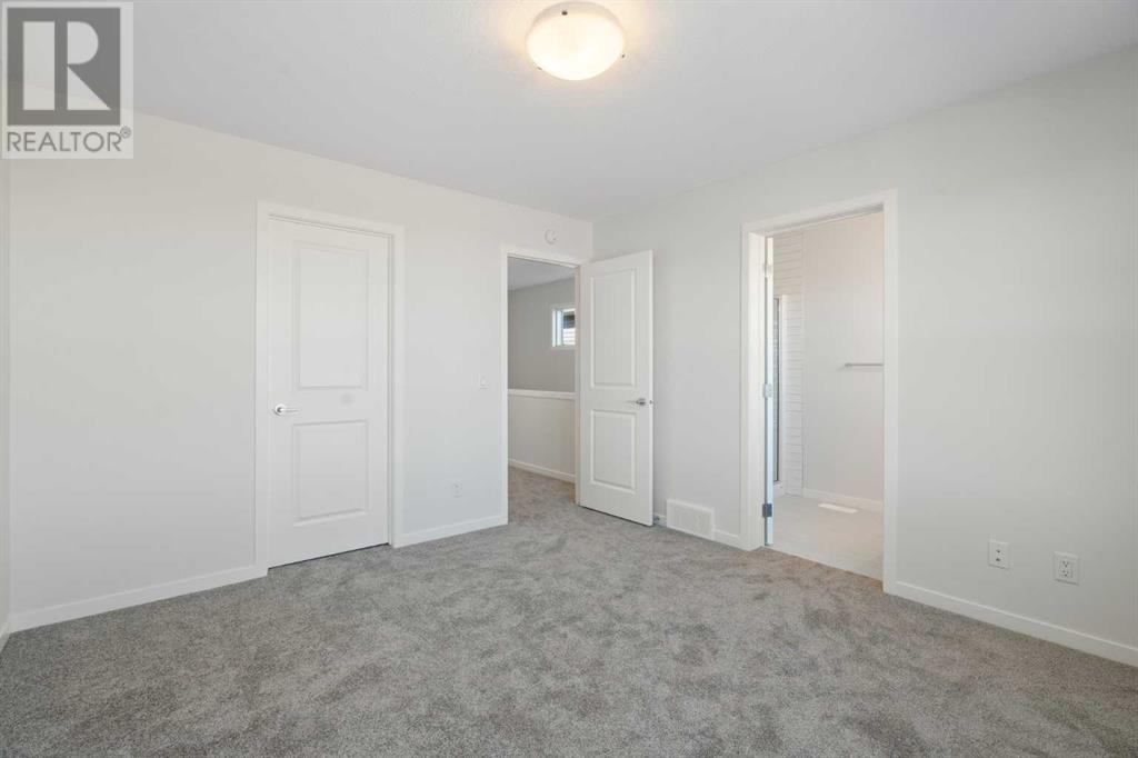 969 Creekview Drive Sw, Calgary, Alberta  T2X 5X6 - Photo 21 - A2202280