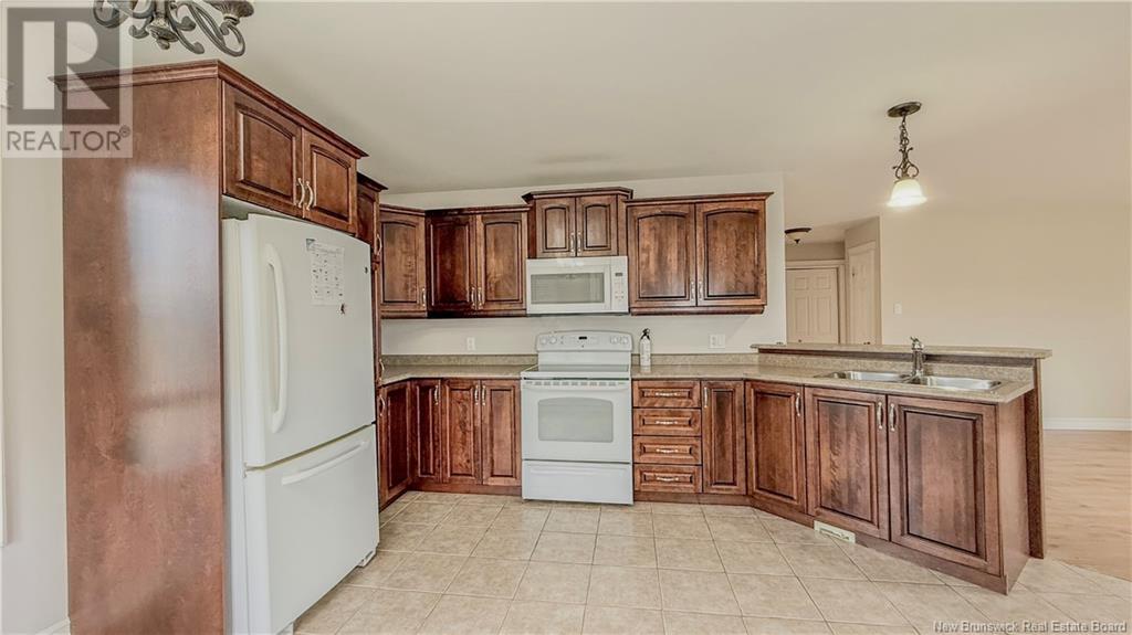 741 Principale, Beresford, New Brunswick  E8K 1W6 - Photo 8 - NB112971