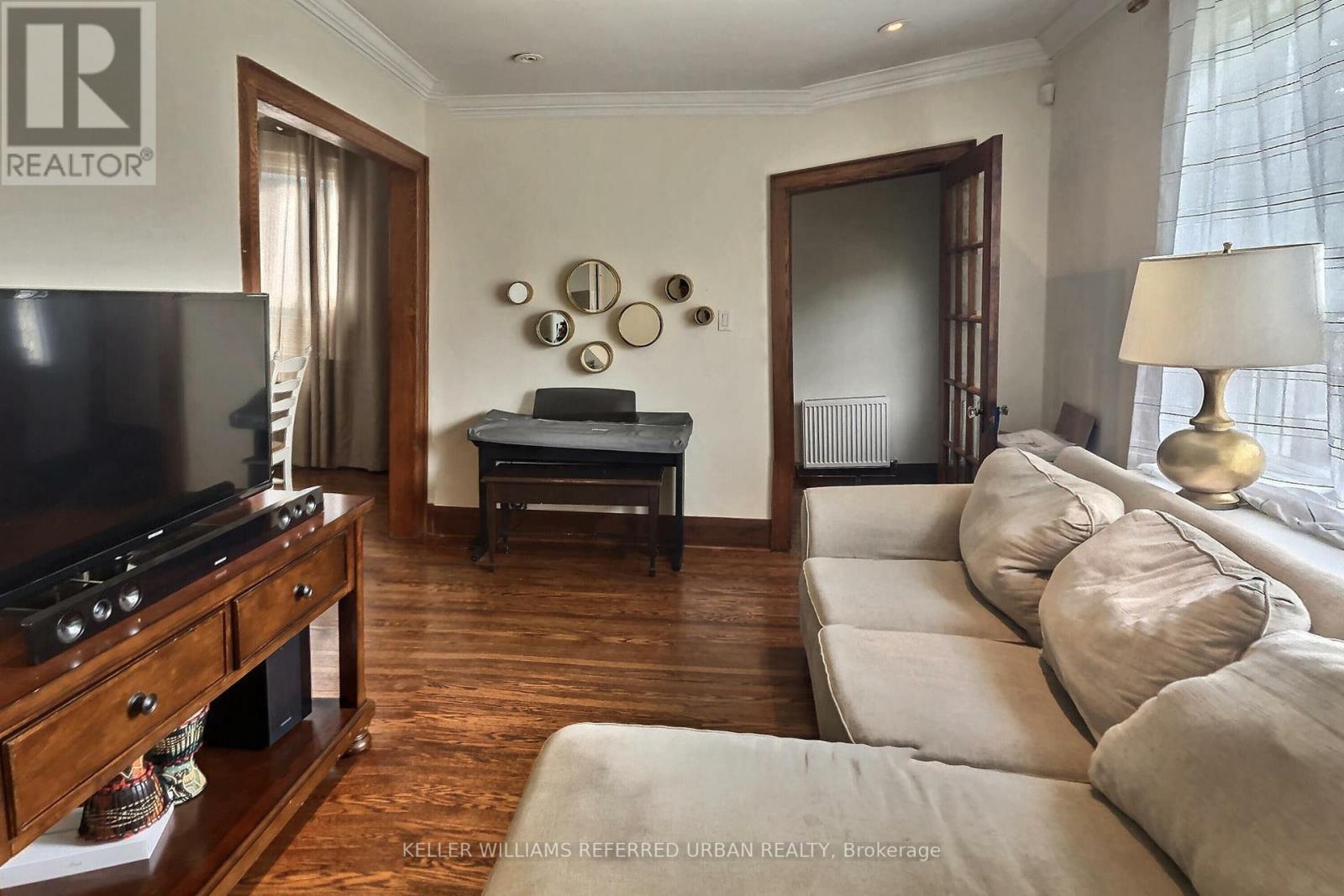 Main Floor - 111 Clovelly Avenue, Toronto, Ontario  M6E 2E7 - Photo 3 - C12181614