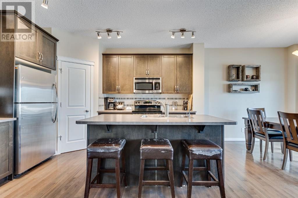 291 Cimarron Vista Court, Okotoks, Alberta  T1S 2H2 - Photo 9 - A2220259