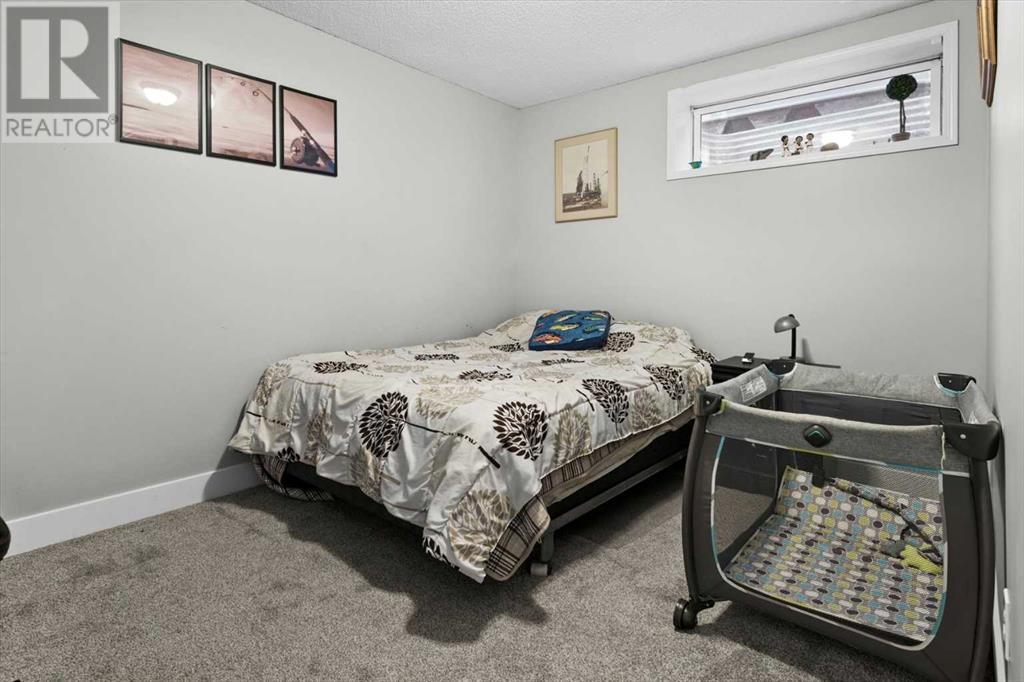 110 Rocky Ridge Green Nw, Calgary, Alberta  T3G 4R6 - Photo 36 - A2217819