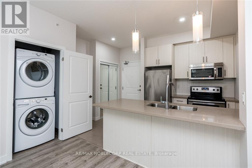 116 - 35 Southshore Crescent, Hamilton (Stoney Creek), Ontario  L8E 0J2 - Photo 6 - X12182210