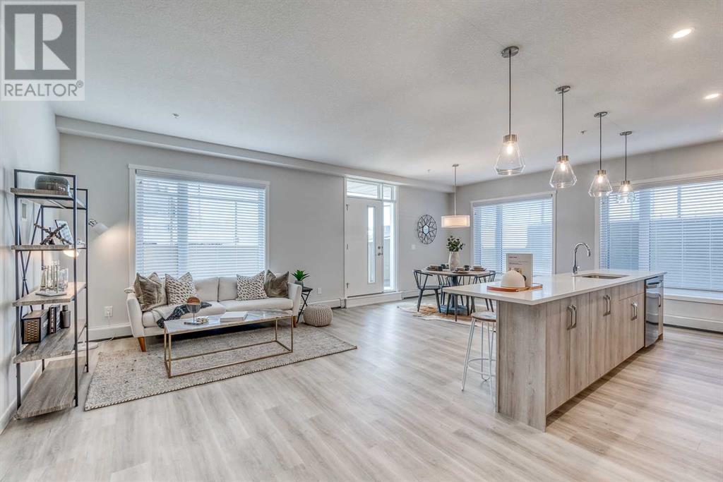 114, 71 Shawnee Common Sw, Calgary, Alberta  T2Y 0R2 - Photo 1 - A2206793