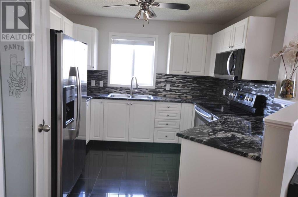 418, 1000 Somervale Court Sw, Calgary, Alberta  T2Y 4K4 - Photo 9 - A2217599