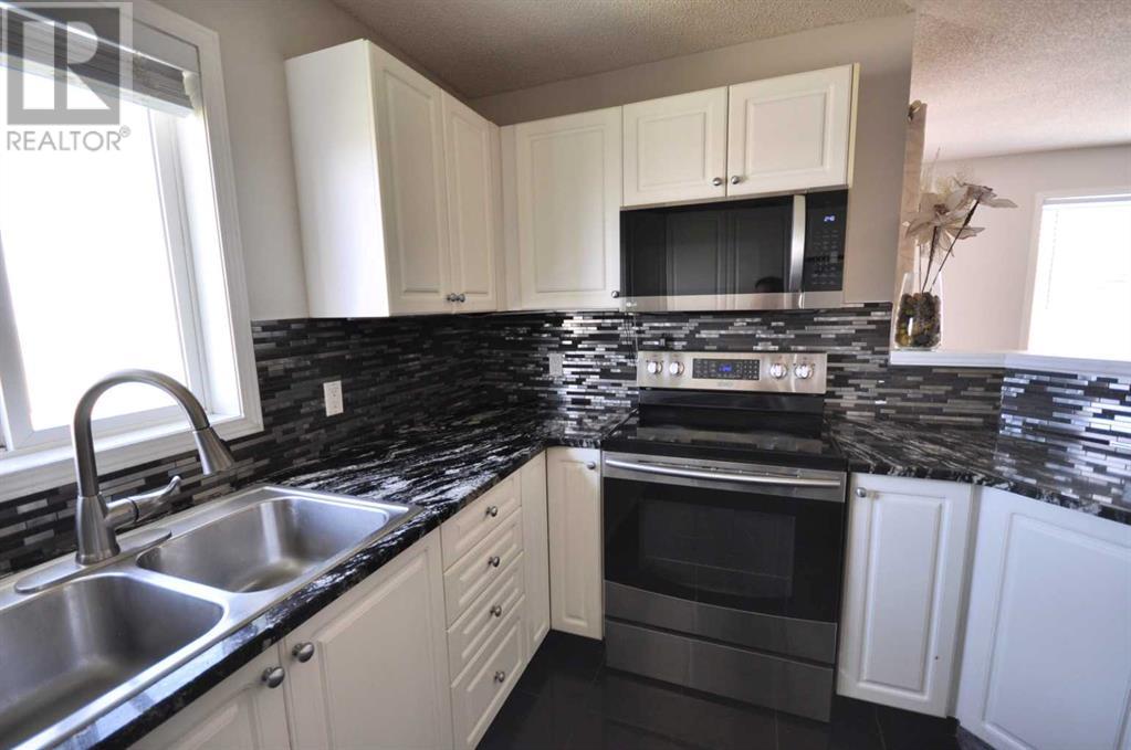 418, 1000 Somervale Court Sw, Calgary, Alberta  T2Y 4K4 - Photo 8 - A2217599