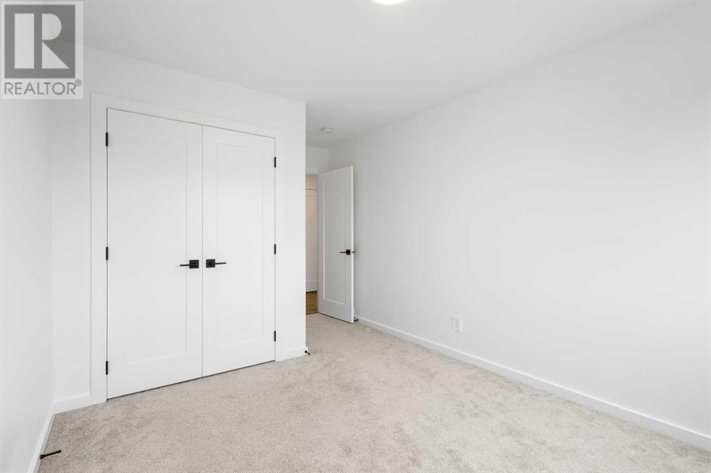 296 Spring Creek Circle Sw, Calgary, Alberta  T3H 6G4 - Photo 29 - A2218176