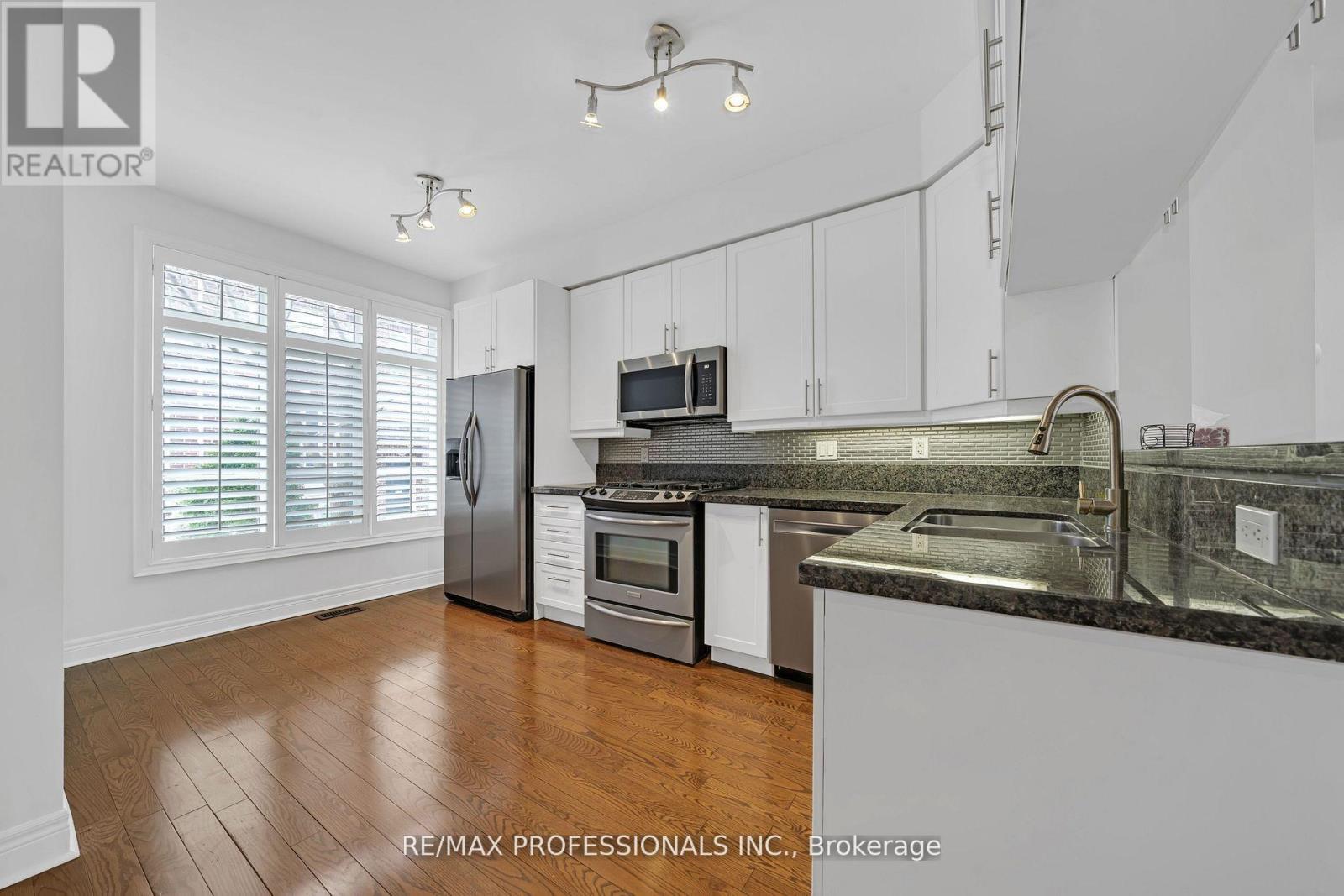 59 Furrow Lane, Toronto, Ontario  M8Z 0A1 - Photo 3 - W12182507
