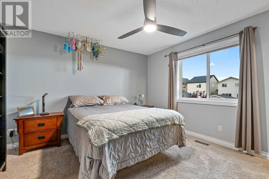 10 Reunion Grove Nw, Airdrie, Alberta  T4B 0Z7 - Photo 22 - A2225173