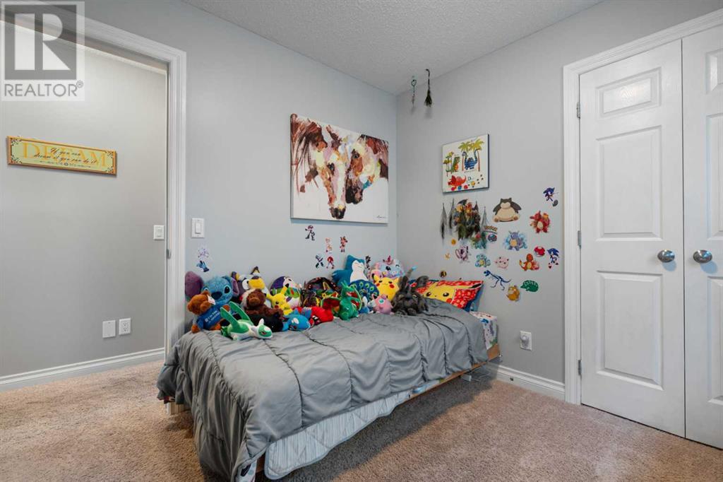 10 Reunion Grove Nw, Airdrie, Alberta  T4B 0Z7 - Photo 25 - A2225173