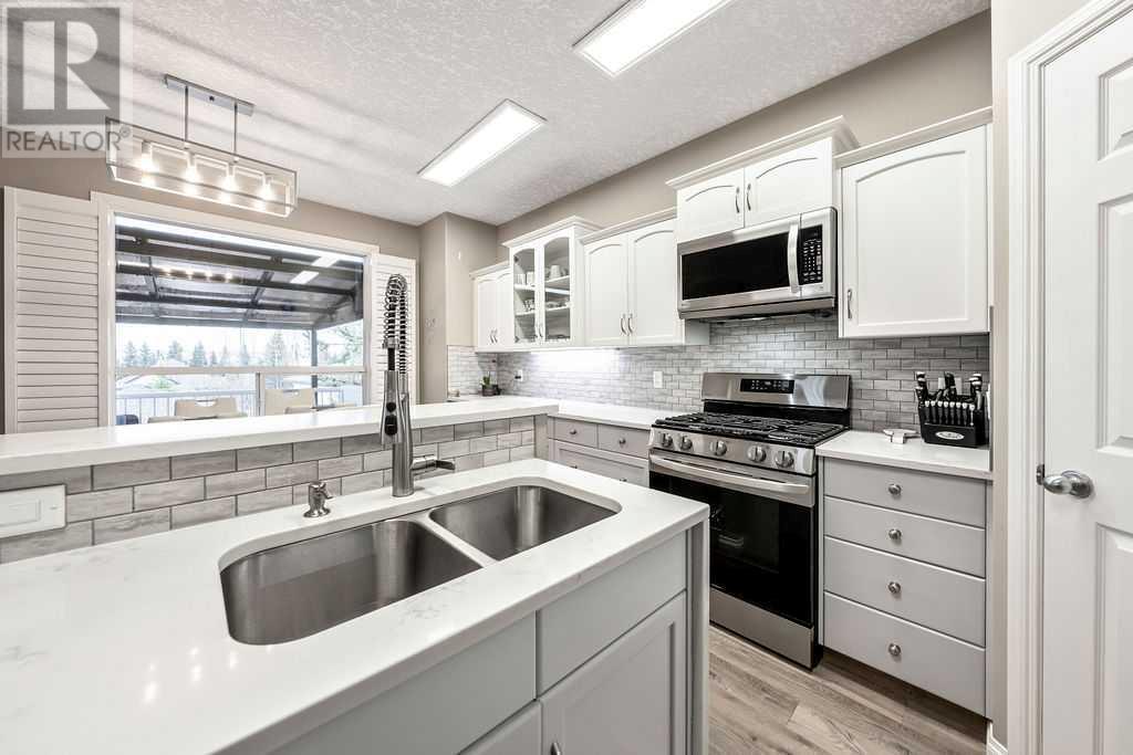 149 Bow Ridge Crescent, Cochrane, Alberta  T4C 1V2 - Photo 13 - A2219540