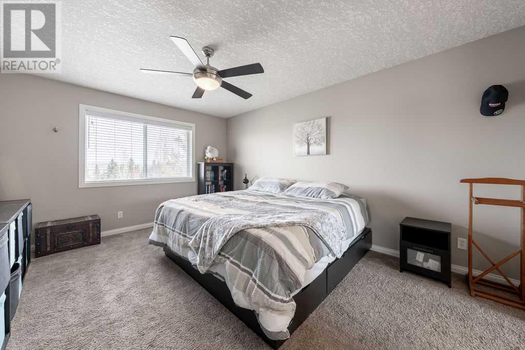 149 Bow Ridge Crescent, Cochrane, Alberta  T4C 1V2 - Photo 21 - A2219540