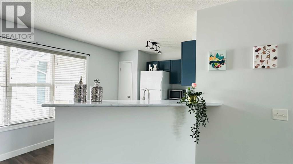 208 Mckenzie Towne Link Se, Calgary, Alberta  T2Z 4G3 - Photo 6 - A2224890