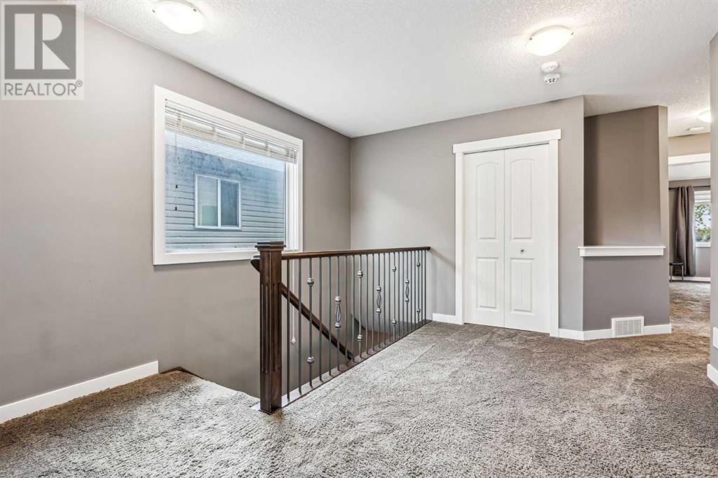 107 Panatella Cape Nw, Calgary, Alberta  T3K 0W4 - Photo 16 - A2223660