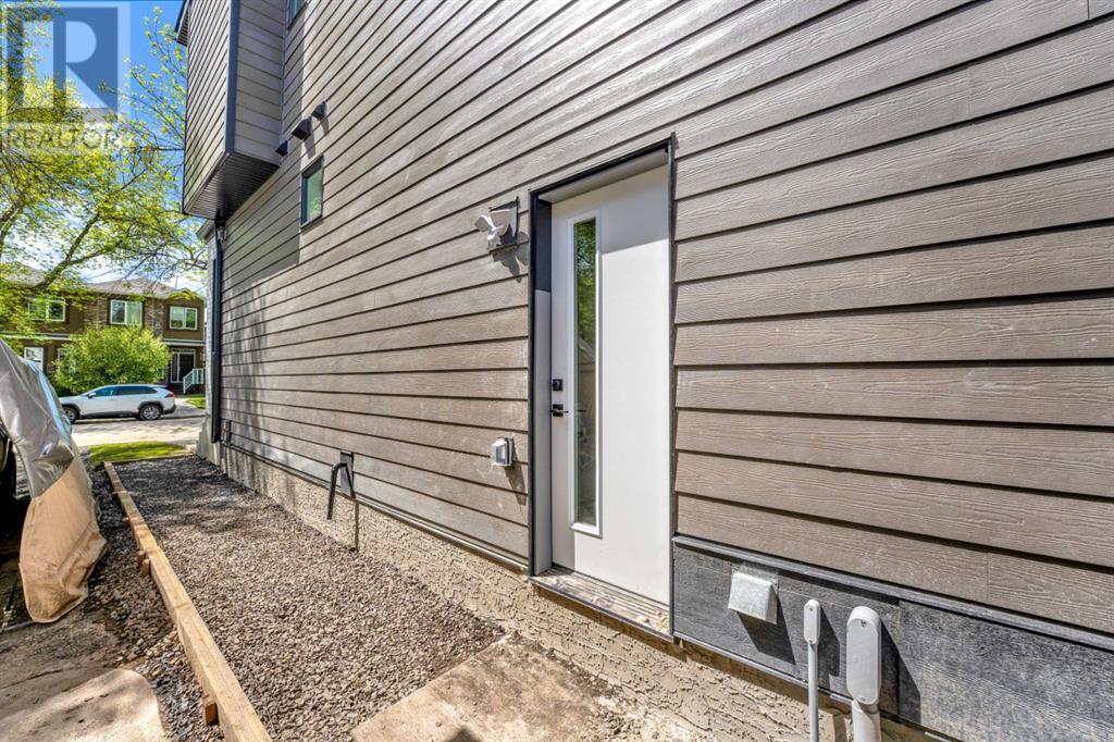 432 23 Avenue Nw, Calgary, Alberta  T2M 1S4 - Photo 4 - A2225629