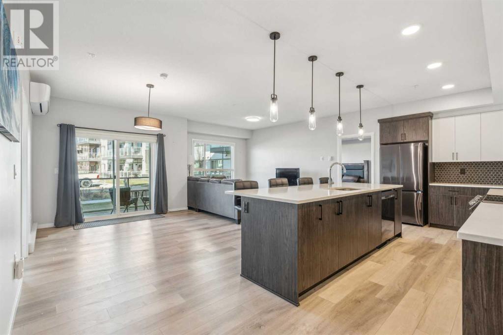 113, 360 Harvest Hills Way Ne, Calgary, Alberta  T3K 2S1 - Photo 3 - A2211848