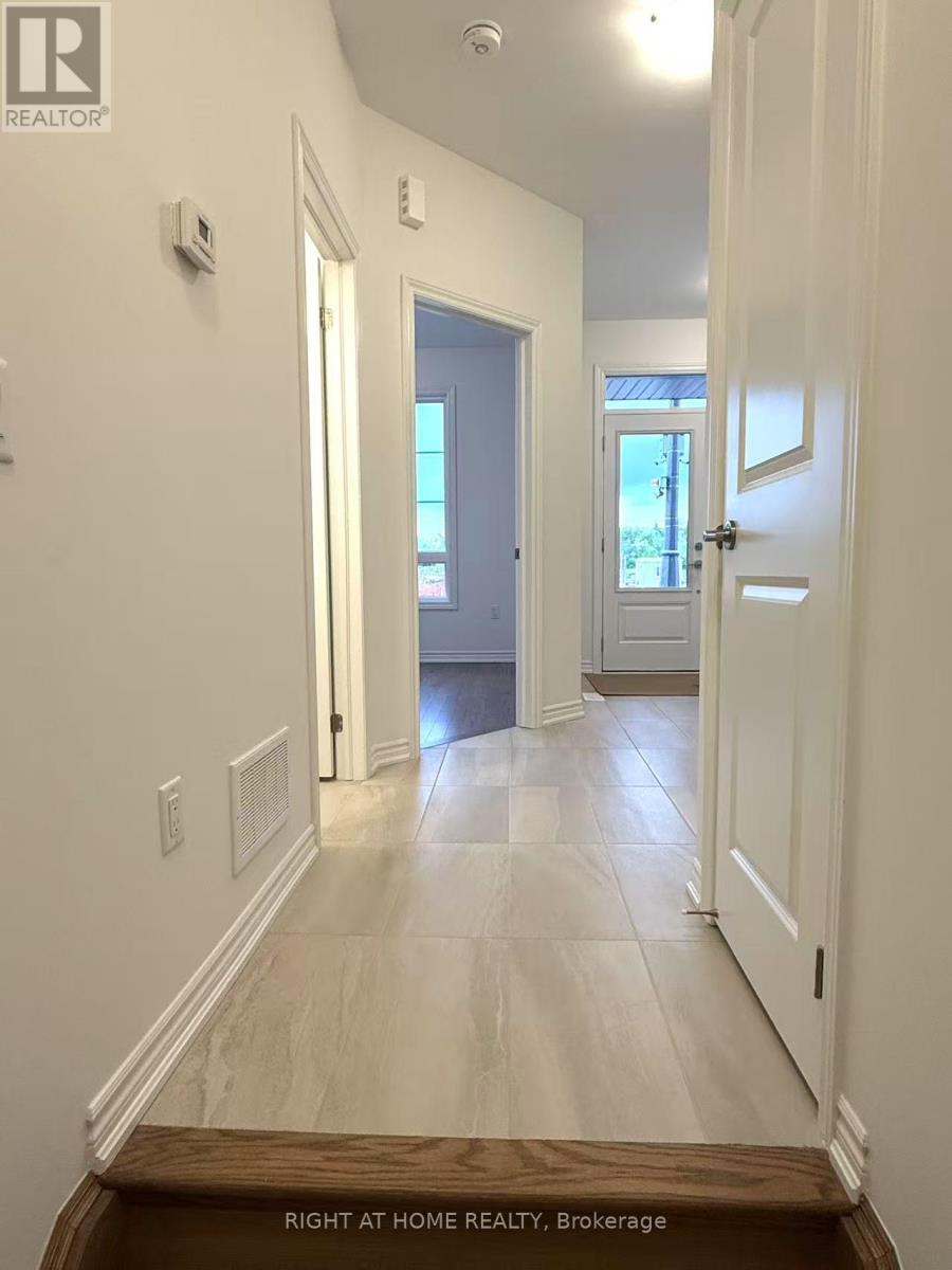 1142 Wheat Boom Drive, Oakville, Ontario  L6H 8C2 - Photo 2 - W12183374