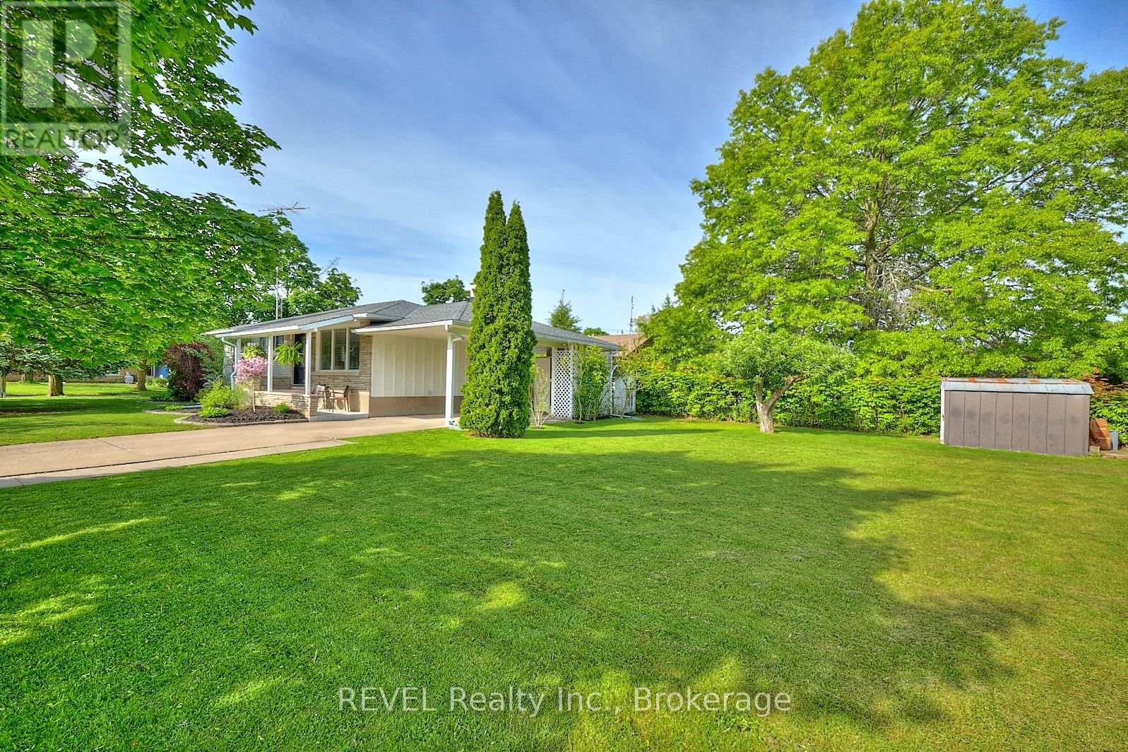 12 Ridley Heights Drive, St. Catharines, Ontario  L2S 2J2 - Photo 2 - X12183989