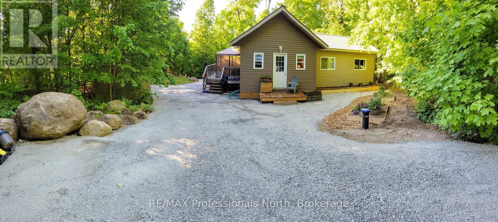 1145 Chelsea Lane, Algonquin Highlands, Ontario  K0M 1J1 - Photo 2 - X12175590