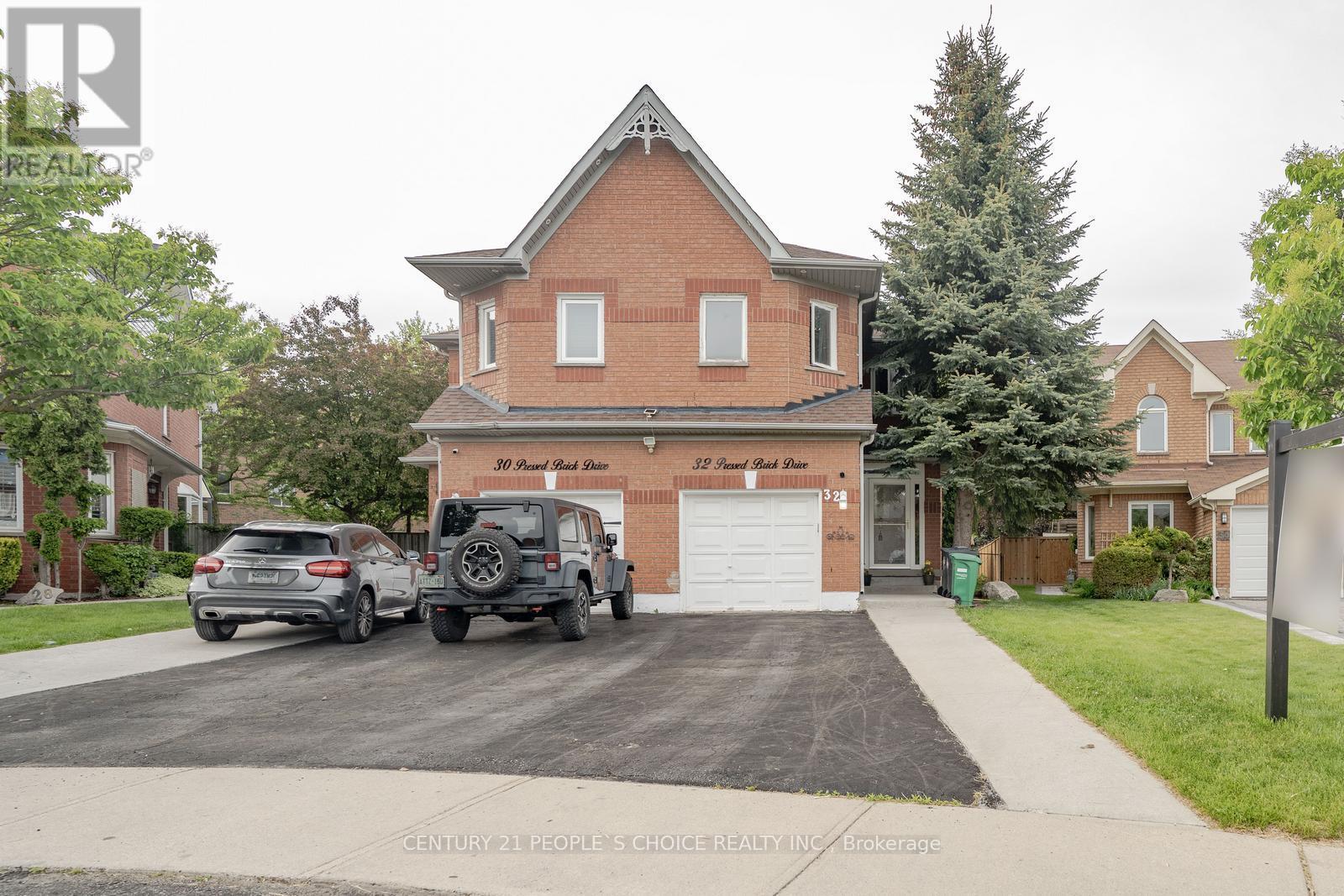 32 Pressed Brick Drive, Brampton (Brampton North), Ontario  L6V 4K3 - Photo 2 - W12162293