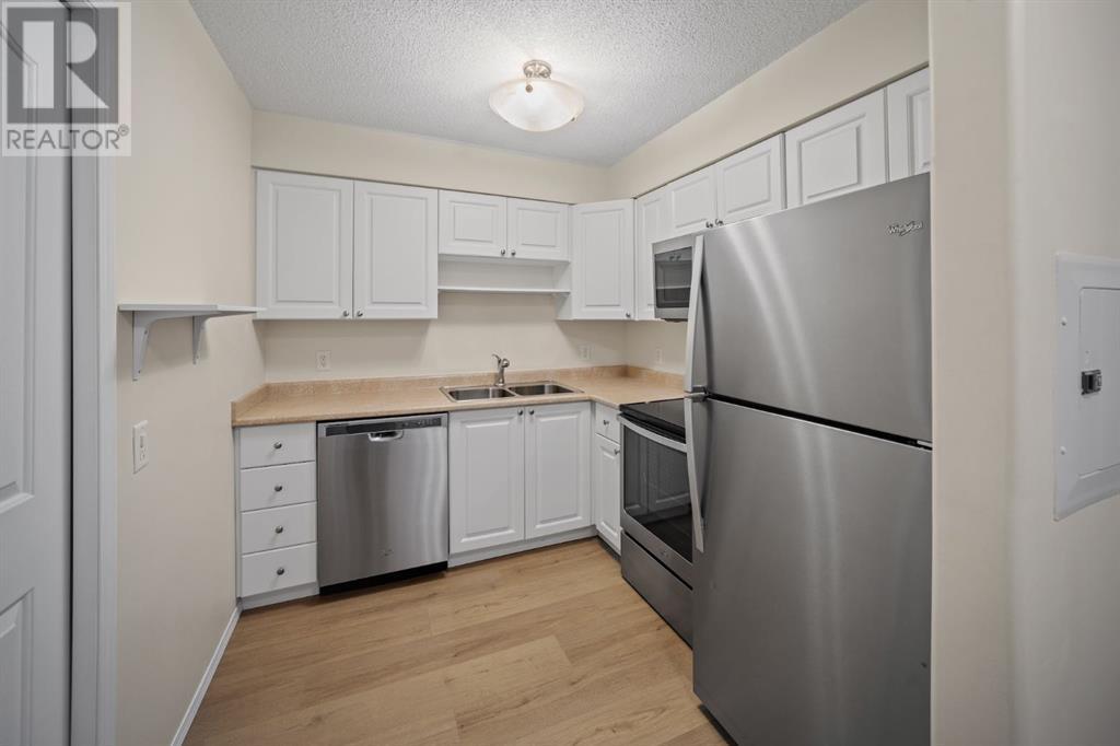 3121 Millrise Point Sw, Calgary, Alberta  T2Y 3W4 - Photo 5 - A2225698