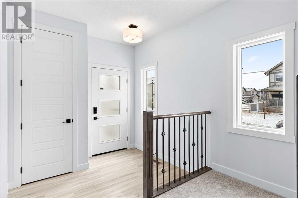 617 Baywater Manor Sw, Airdrie, Alberta  T4B 5R7 - Photo 4 - A2204707