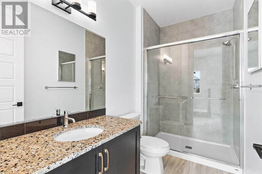 617 Baywater Manor Sw, Airdrie, Alberta  T4B 5R7 - Photo 7 - A2204707