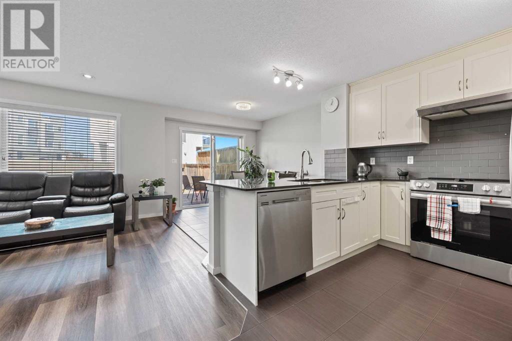 180 Panatella Way Nw, Calgary, Alberta  T3K 0X1 - Photo 4 - A2217410