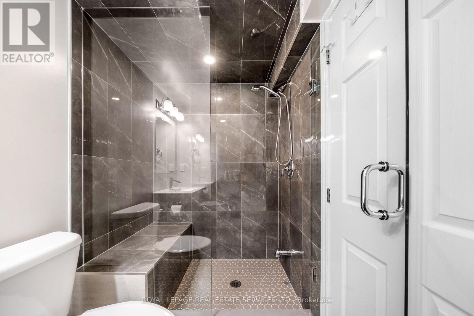 Bsmt Apt 1 - 16 Embers Drive, Toronto, Ontario  M9C 3E5 - Photo 11 - W12186084