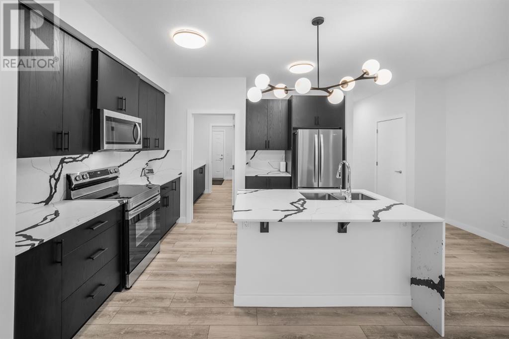 252 Belmont Park Sw, Calgary, Alberta  T2X 5T7 - Photo 8 - A2223672