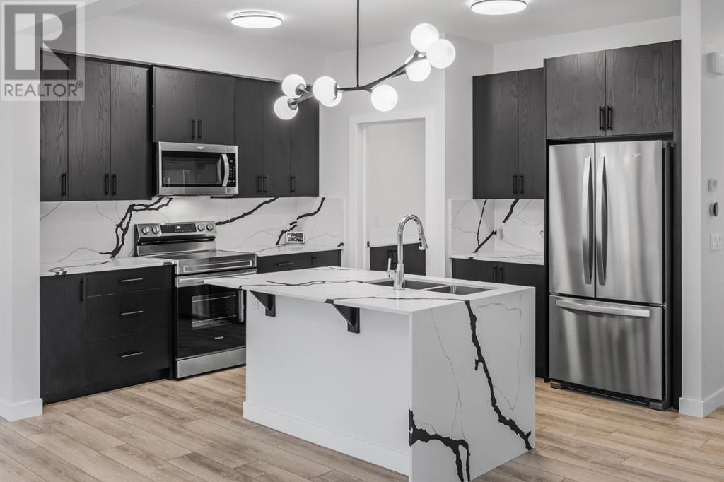 252 Belmont Park Sw, Calgary, Alberta  T2X 5T7 - Photo 10 - A2223672