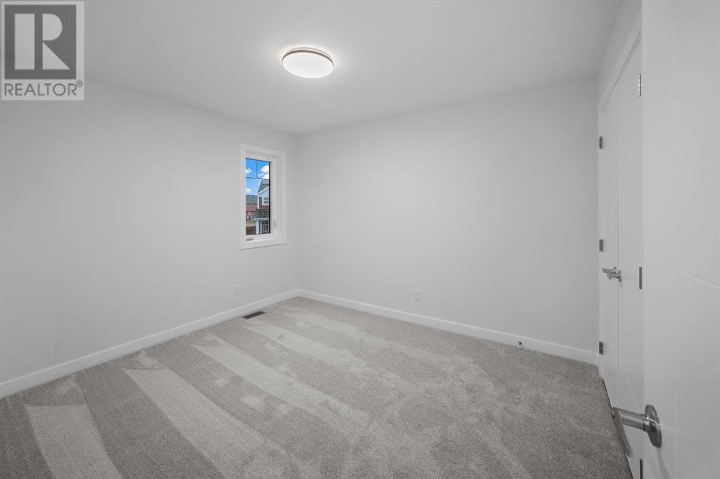 252 Belmont Park Sw, Calgary, Alberta  T2X 5T7 - Photo 36 - A2223672