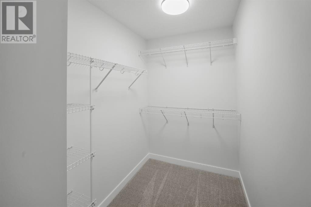 252 Belmont Park Sw, Calgary, Alberta  T2X 5T7 - Photo 31 - A2223672