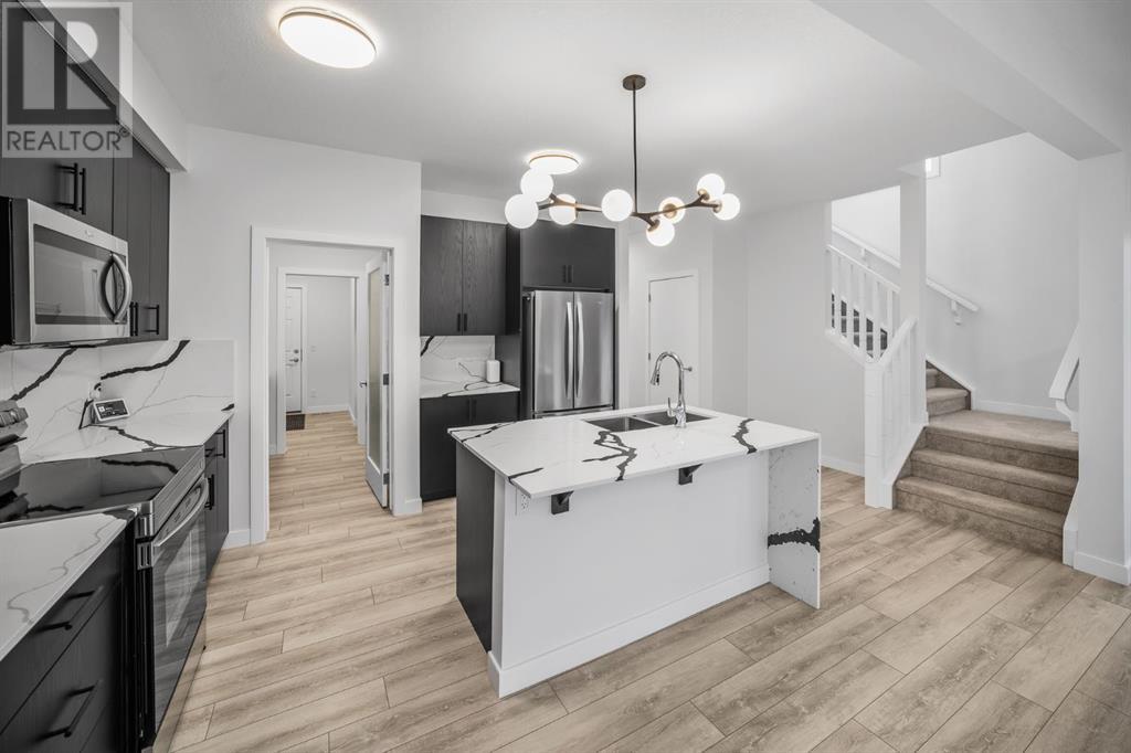 252 Belmont Park Sw, Calgary, Alberta  T2X 5T7 - Photo 7 - A2223672