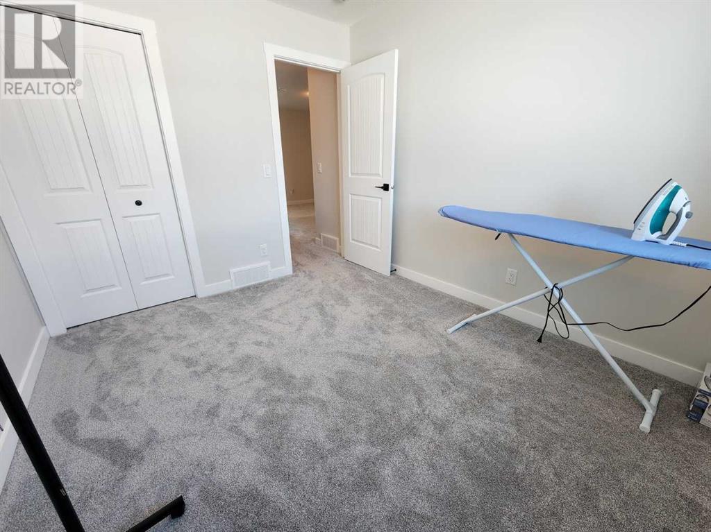 99 Edith Passage Nw, Calgary, Alberta  T3R 2B5 - Photo 37 - A2226472