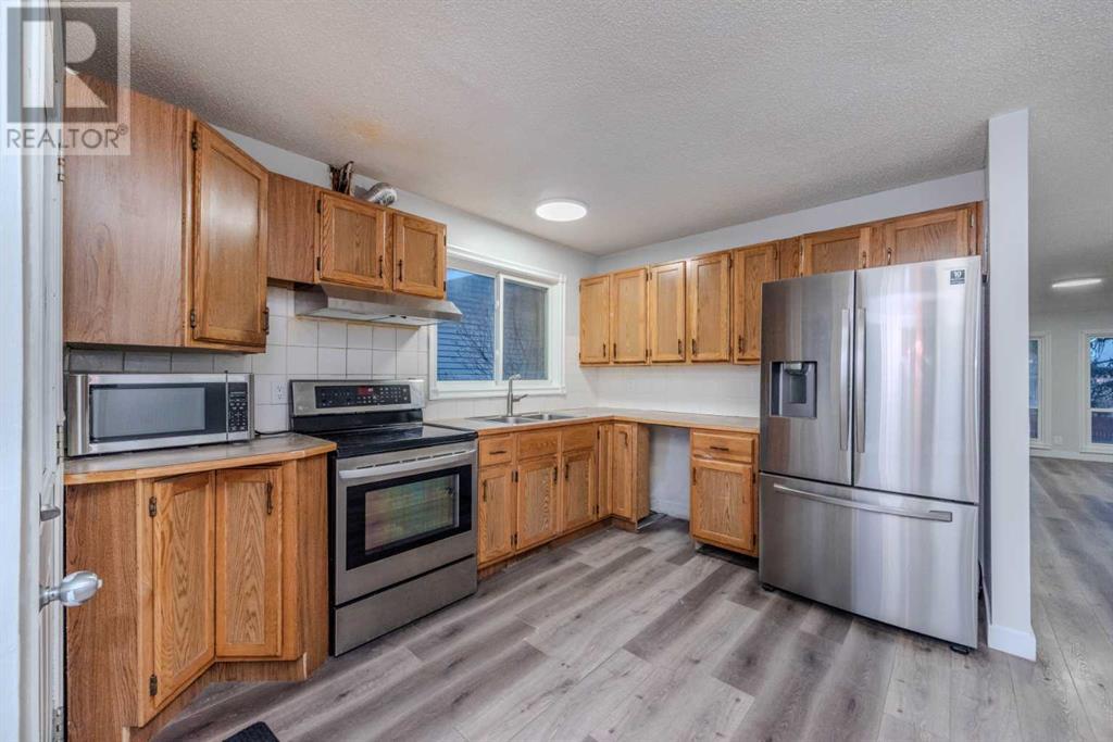 5516 Temple Drive Ne, Calgary, Alberta  T1Y 3R4 - Photo 7 - A2220492