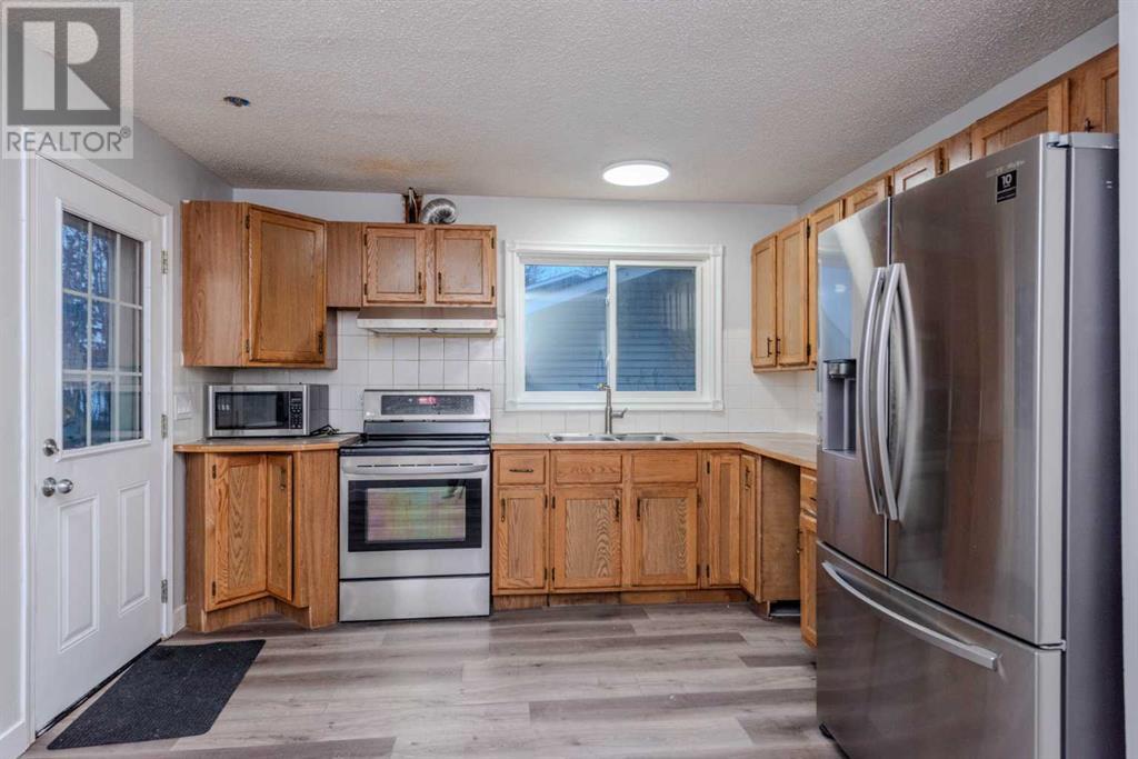 5516 Temple Drive Ne, Calgary, Alberta  T1Y 3R4 - Photo 5 - A2220492