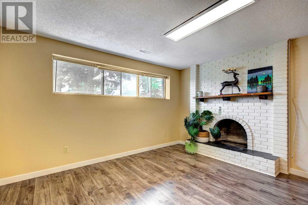 11231 Braeside Drive Sw, Calgary, Alberta  T2W 2V6 - Photo 20 - A2225035