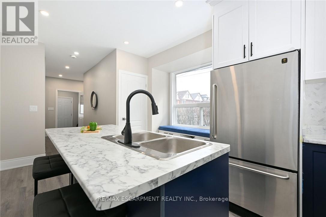 31 Greenaway Avenue, Hamilton, Ontario  L8L 6C3 - Photo 3 - X12186761