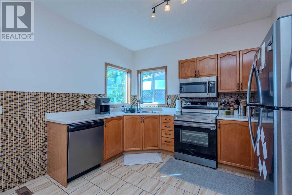 14993 5 Street Sw, Calgary, Alberta  T2Y 3E2 - Photo 9 - A2226537