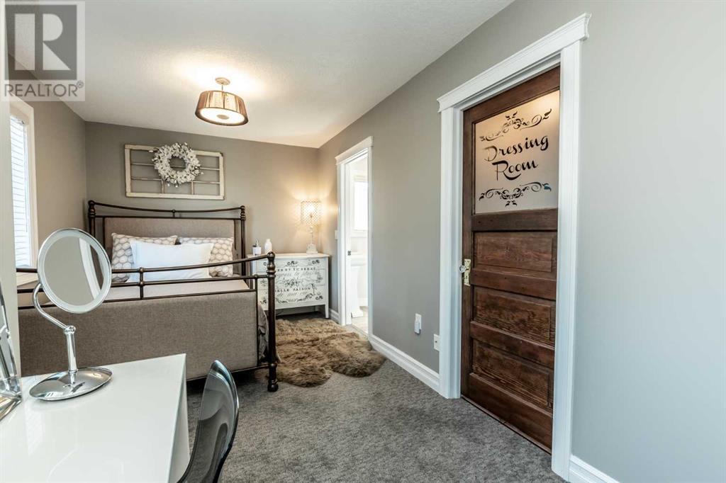 1107 Highland Green View Nw, High River, Alberta  T1V 1P6 - Photo 37 - A2191003