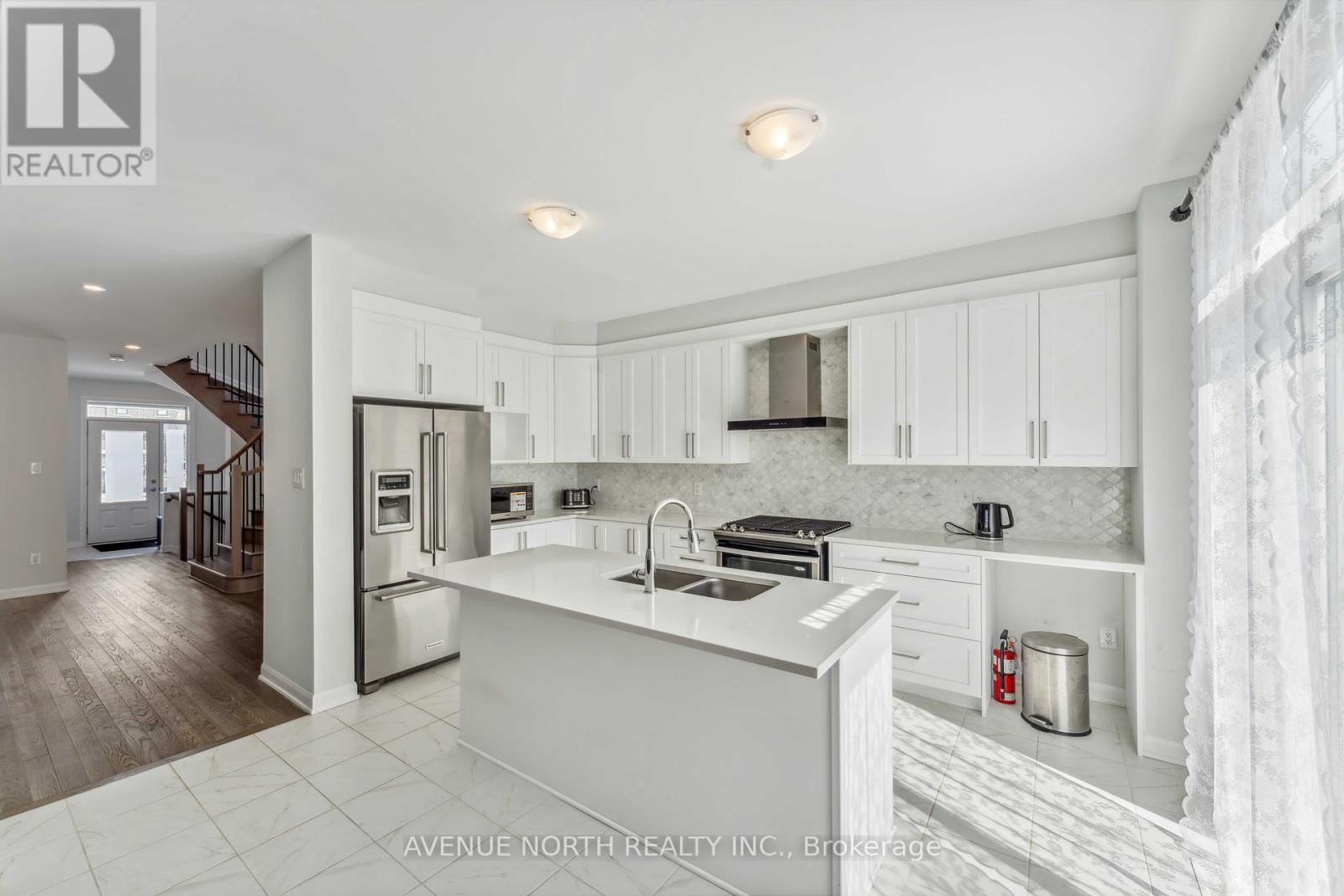841 Cappamore Drive, Ottawa, Ontario  K2J 7C3 - Photo 5 - X12118545