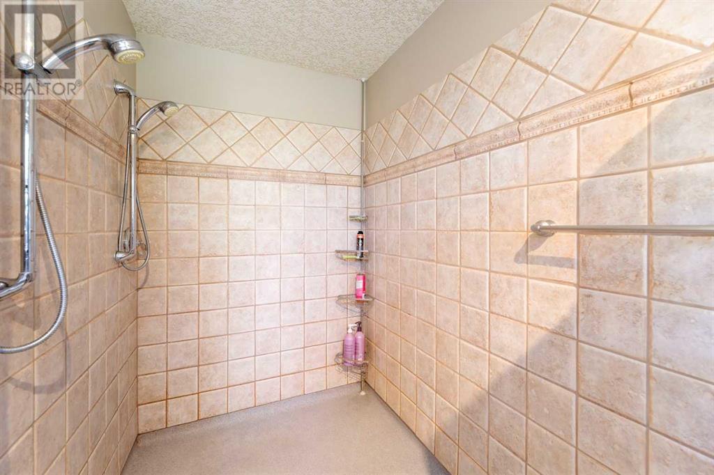 171 Sunterra Ridge Place, Cochrane, Alberta  T4C 1W8 - Photo 22 - A2200183