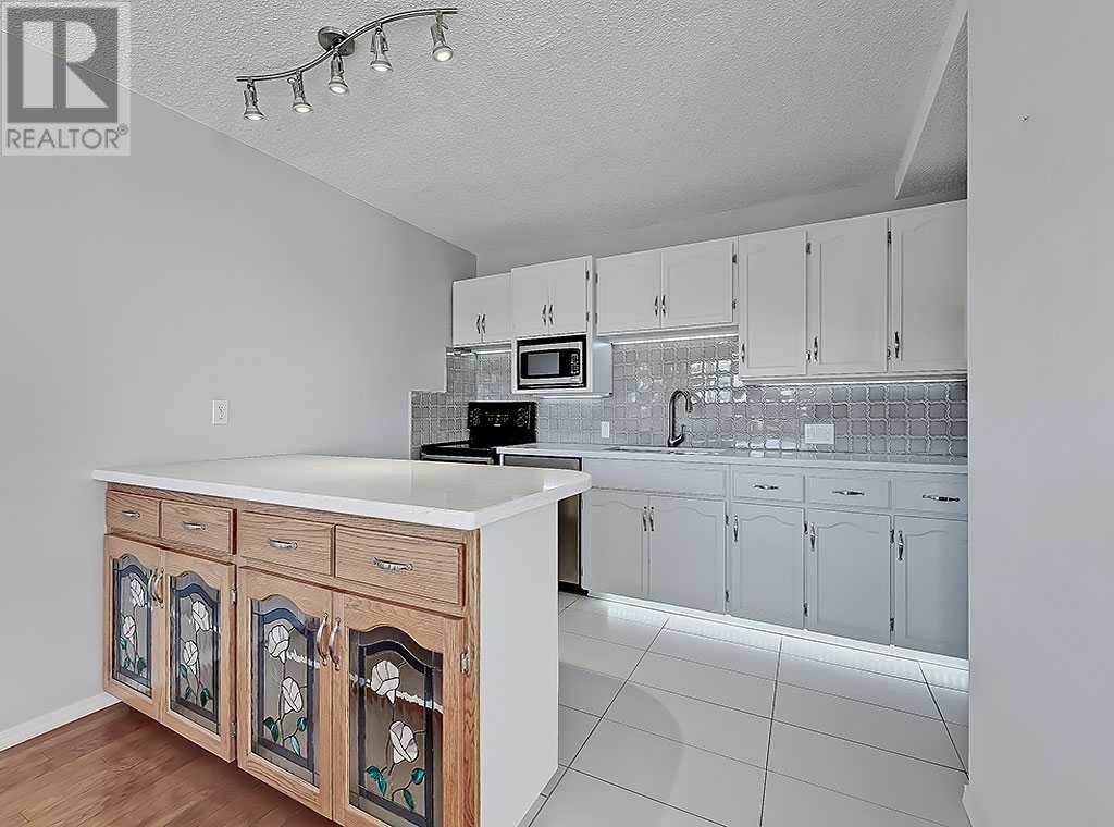 100, 524 Cedar Crescent Sw, Calgary, Alberta  T3C 2Y8 - Photo 19 - A2226405