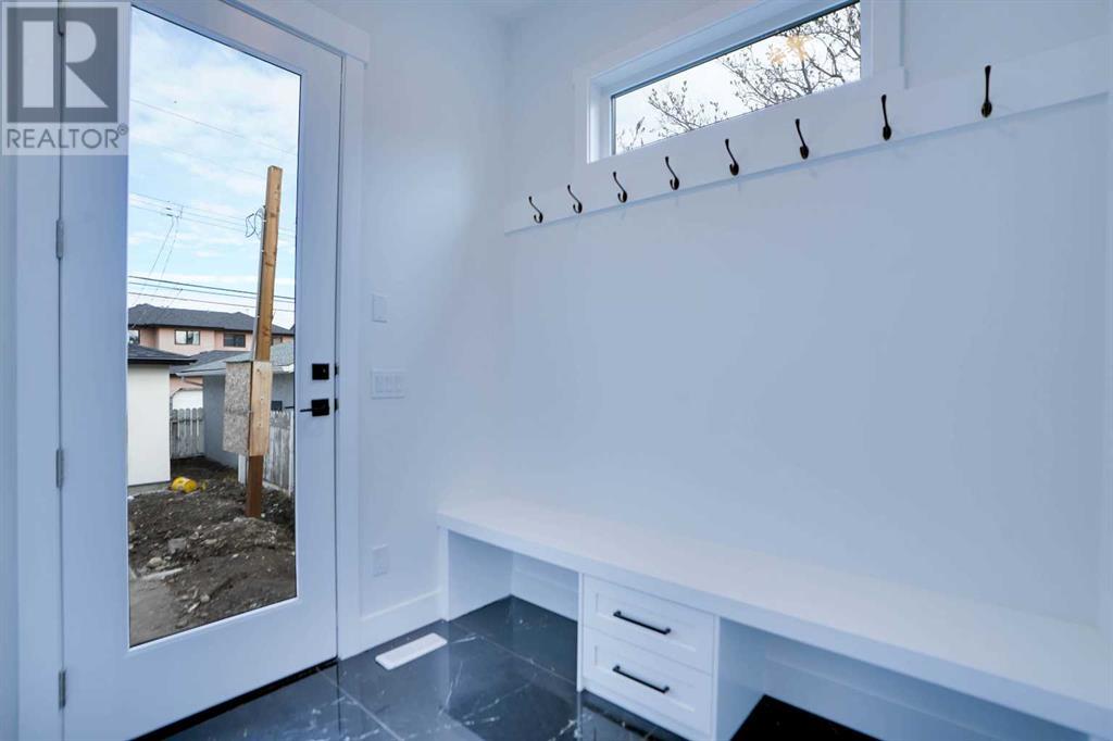1420 41 Street Sw, Calgary, Alberta  T3C 1X6 - Photo 3 - A2214160