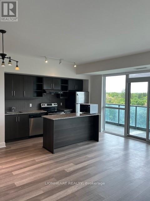 704 - 35 Brian Peck Crescent, Toronto, Ontario  M4G 0A5 - Photo 4 - C12187649