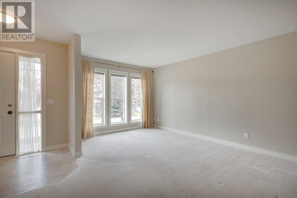 114 Everridge Common Sw, Calgary, Alberta  T2Y 5H1 - Photo 4 - A2219647