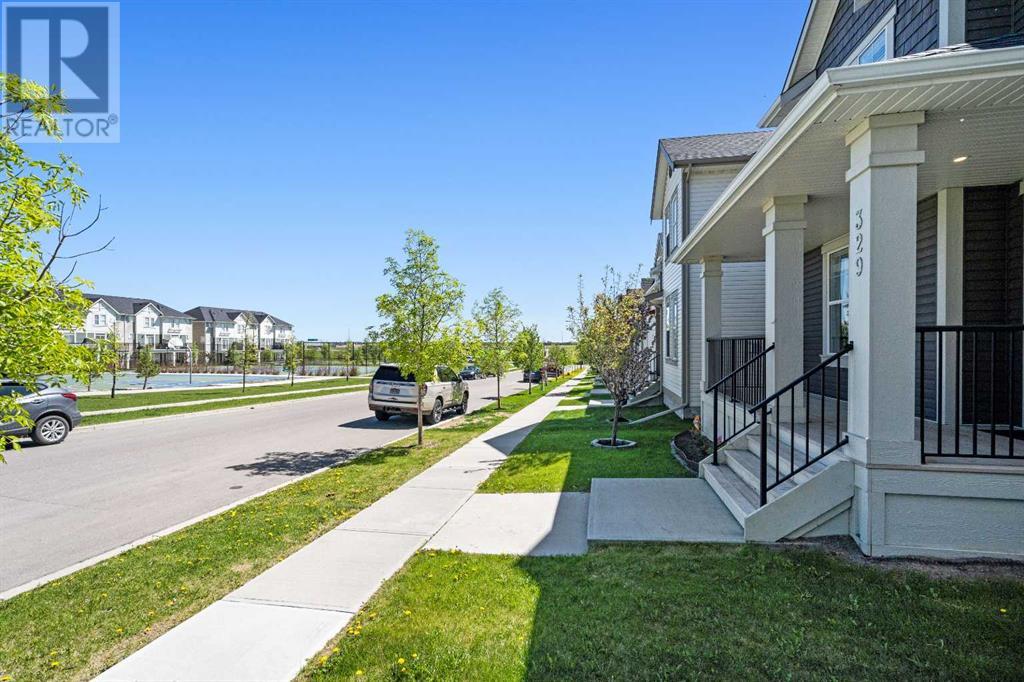 329 South Point Green Sw, Airdrie, Alberta  T4B 4L1 - Photo 3 - A2225660