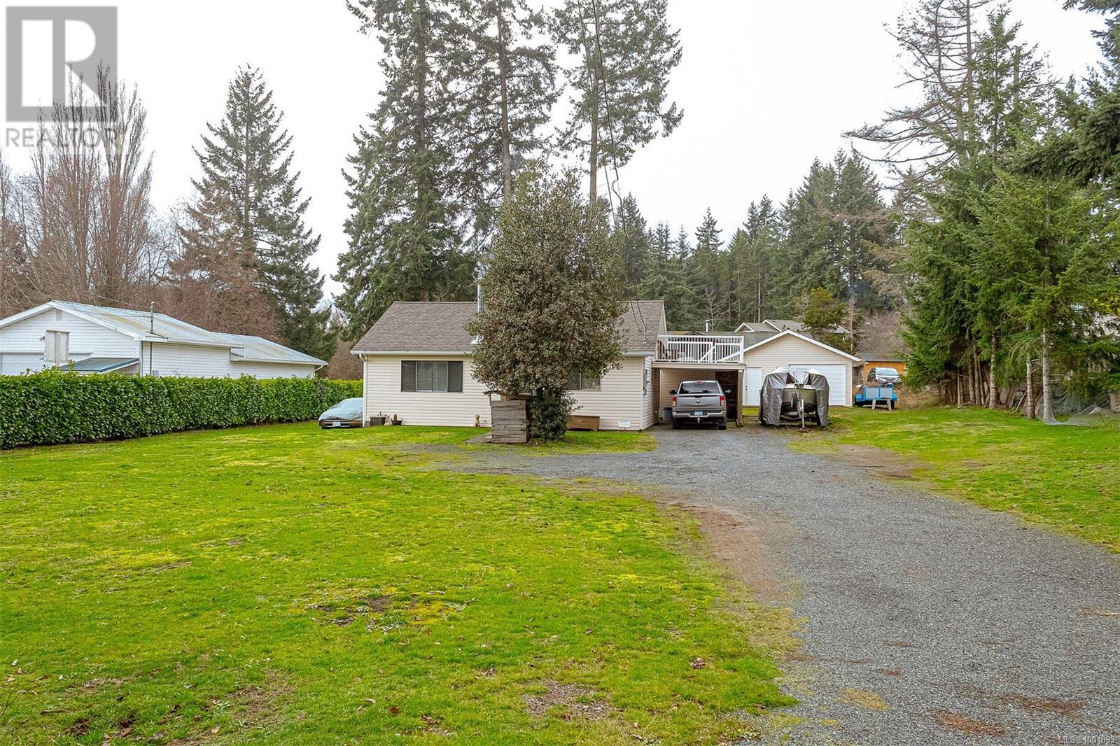 5580 Island Hwy W, Qualicum Beach, British Columbia  V9K 2E7 - Photo 2 - 1001893