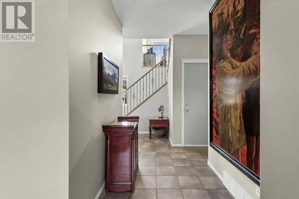 418 Cresthaven Place Sw, Calgary, Alberta  T3B 5W6 - Photo 4 - A2217847