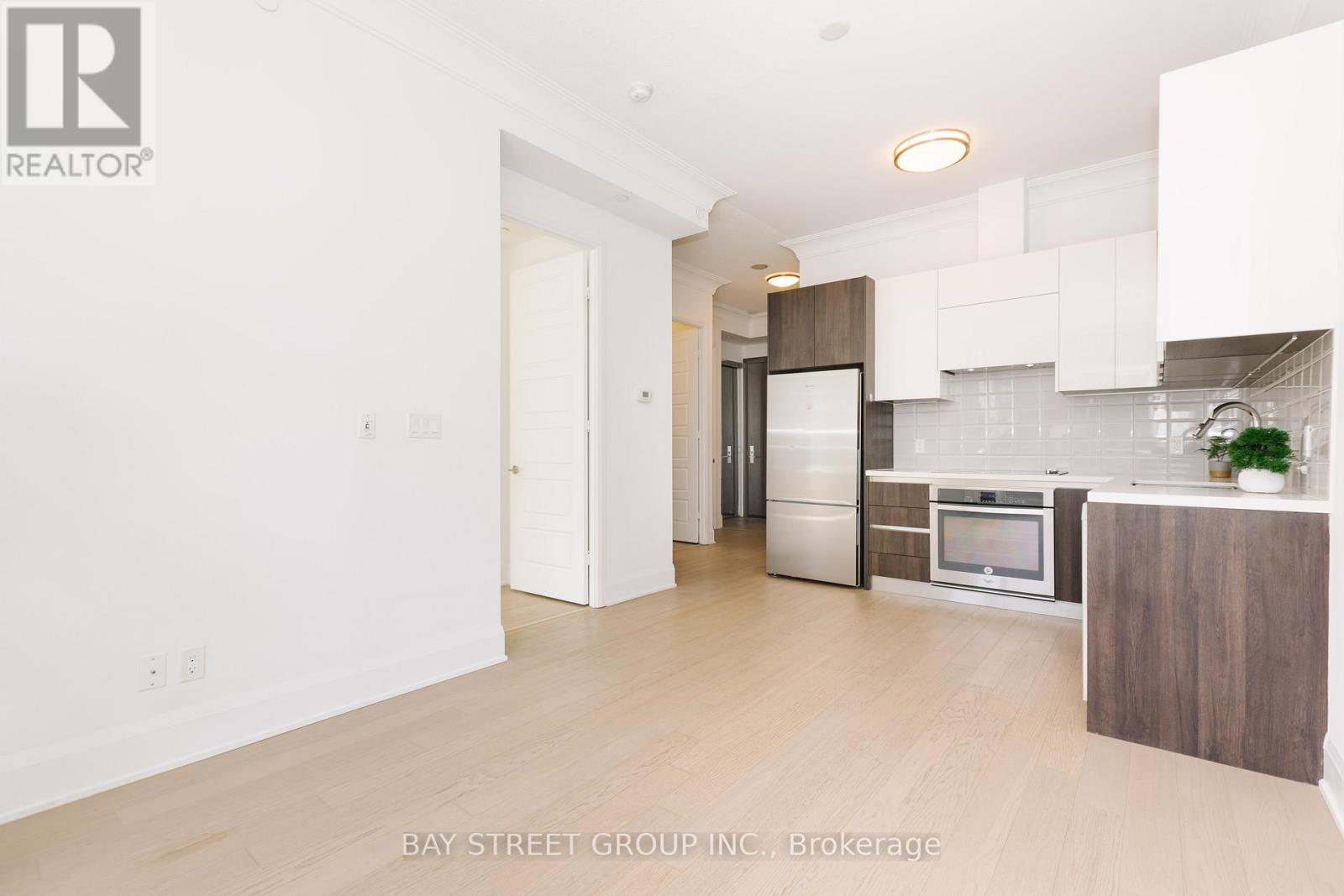 201 - 25 Water Walk Drive, Markham, Ontario  L6G 0G3 - Photo 7 - N12187987
